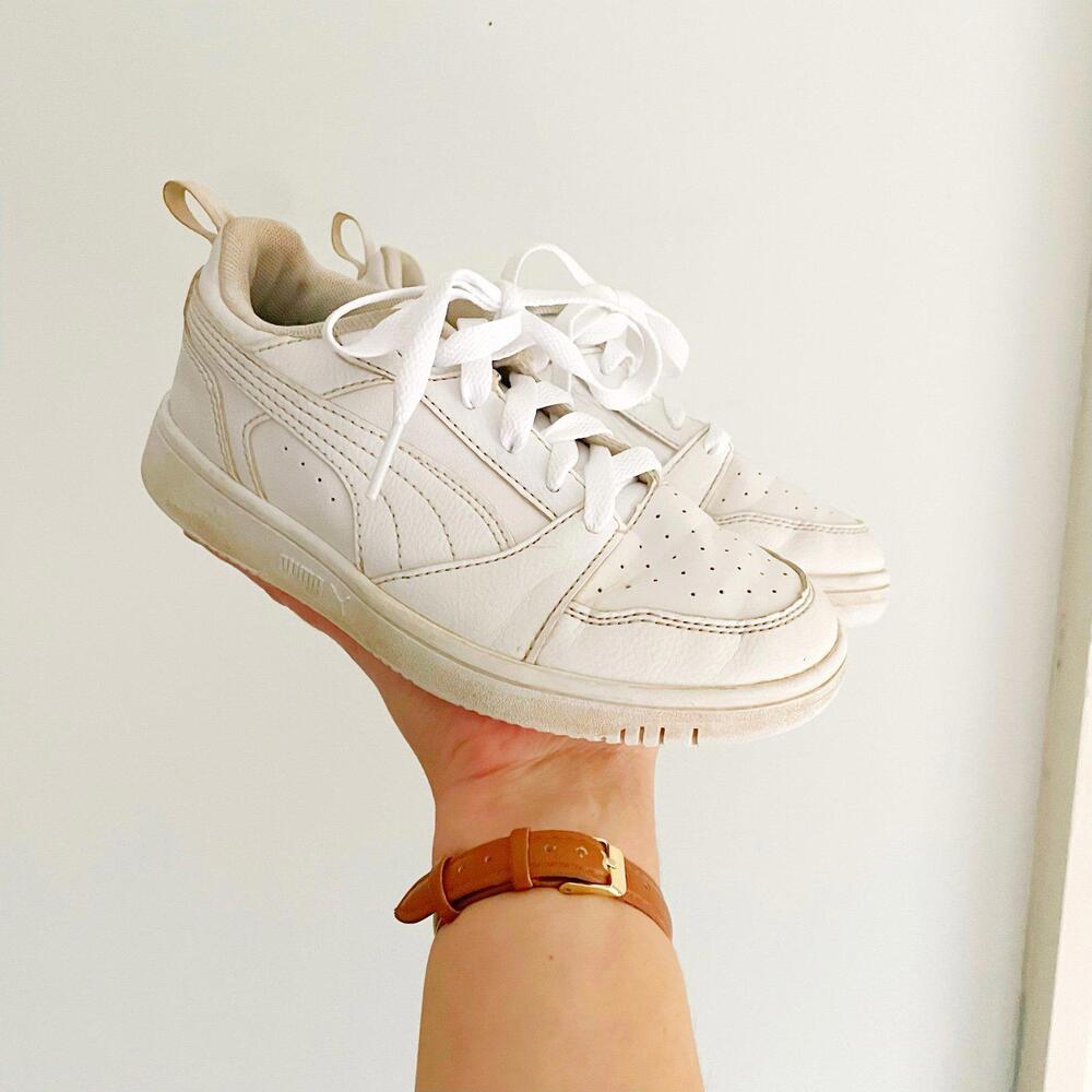 Kids White PUMA Rebound V6 Low sneakers.